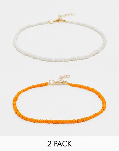 Lot de 2 bracelets de cheville en perles - Blanc et orange - Designb London - Modalova