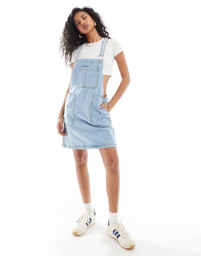 DTT - Robe chasuble en jean avec poches - moyen - Don't Think Twice - Modalova