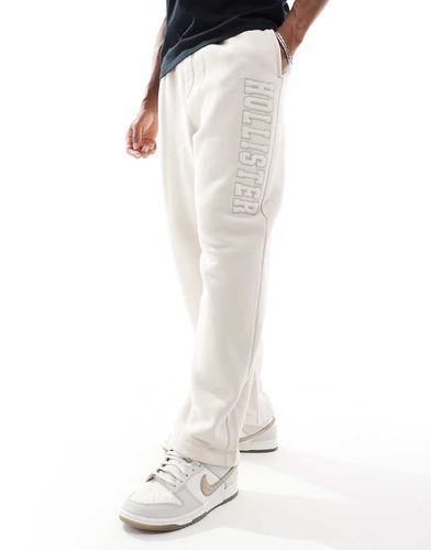 Pantalon de jogging d'ensemble droit coupe baggy à logo - Beige - Hollister - Modalova