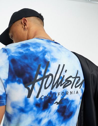 T-shirt long effet délavé à l'acide avec logo devant et au dos - Hollister - Modalova