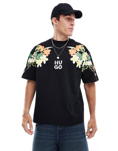 Diblostee - T-shirt oversize avec imprimé fleurs positionné sur la manche - Hugo Red - Modalova