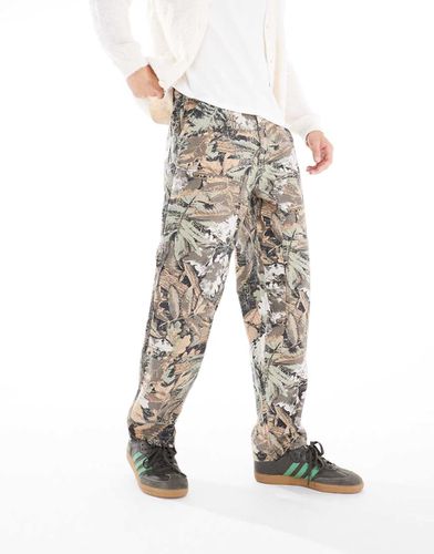 Pantalon coupe ample à motif feuilles style camouflage - Beige - Only & Sons - Modalova