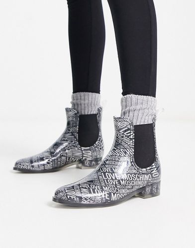 Bottines avec logo sur l'ensemble - Love Moschino - Modalova