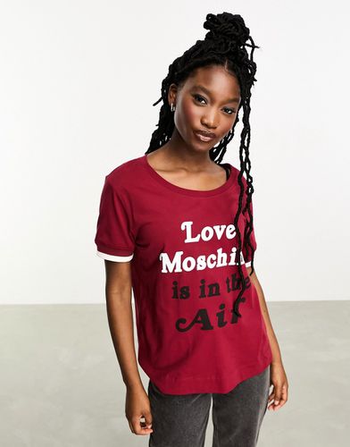 Is in the hair - T-shirt manches courtes avec inscription imprimée - Love Moschino - Modalova