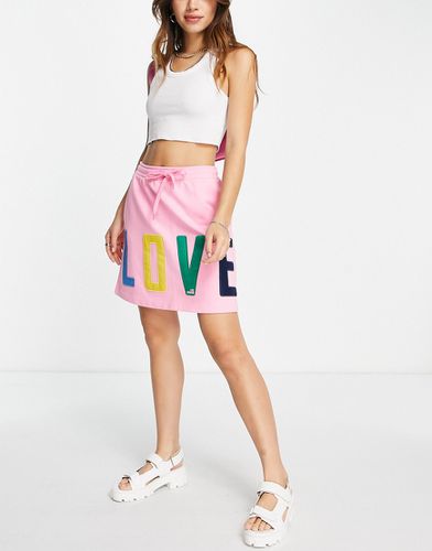 Mini-jupe en jersey à logo - Love Moschino - Modalova