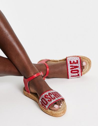 Sandales plates à logo - Love Moschino - Modalova