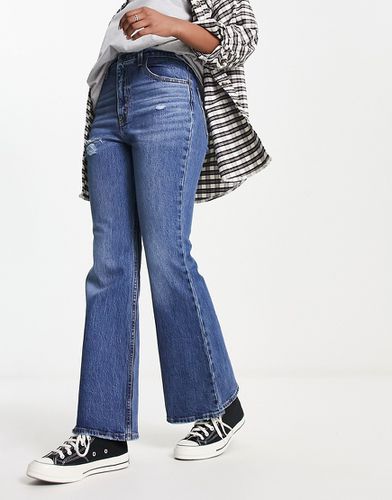 Jean taille haute évasé avec effet vieilli style années 70 - moyen délavé - Levi's - Modalova