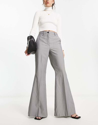 Pantalon coupe ajustée puis évasée à chevrons - Monki - Modalova