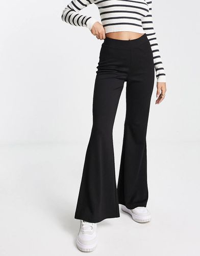 Pantalon évasé en jersey - Monki - Modalova