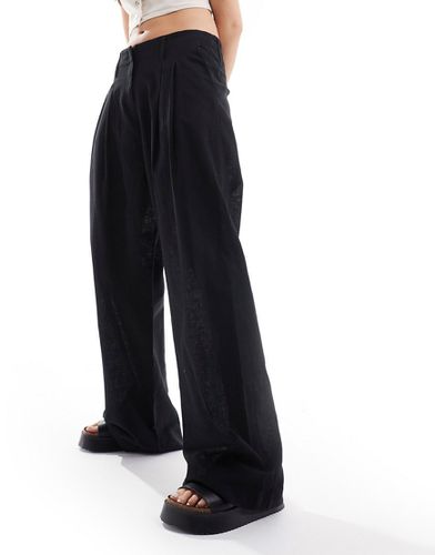 Pantalon habillé ample en lin - Monki - Modalova