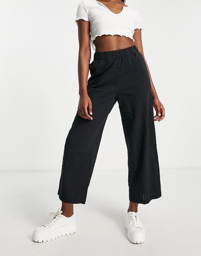 Pantalon large en crépon - Monki - Modalova