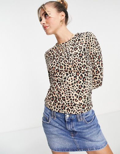 Top manches longues en jersey à imprimé léopard - Monki - Modalova