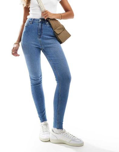 Jean skinny à taille haute - délavé moyen - Miss Selfridge - Modalova