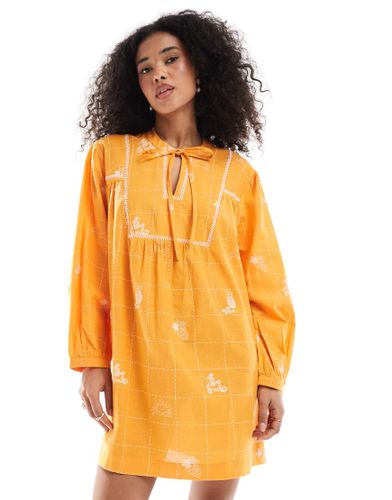 Robe babydoll courte  manches bouffantes et broderies - Native Youth - Modalova