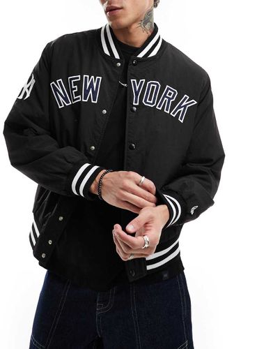 Bomber style universitaire avec logo NY Yankees - Noir - New Era - Modalova