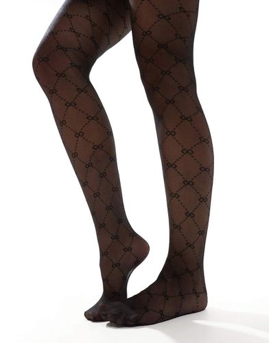 Collants à motif nauds - New Look - Modalova