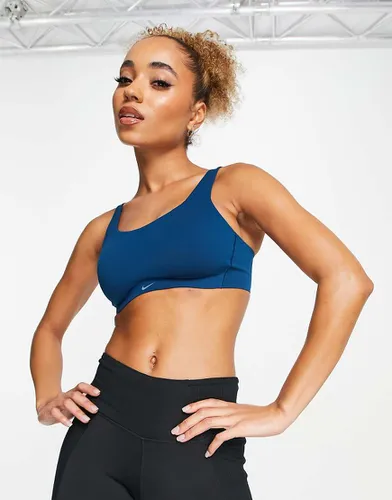 Alate Coverage - Brassière de sport soutien léger en tissu Dri-FIT - Nike Training - Modalova