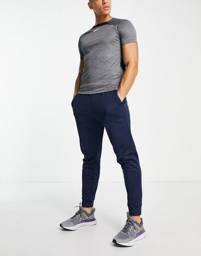 Pantalon de jogging fuselé en Therma-FIT - Nike Training - Modalova