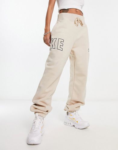Pantalon de jogging oversize style universitaire - Beige sable - Nike - Modalova