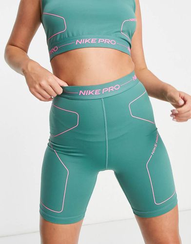 Nike Pro - Training Seasonal - Short moulant à taille haute - Vert/rose - Nike Training - Modalova