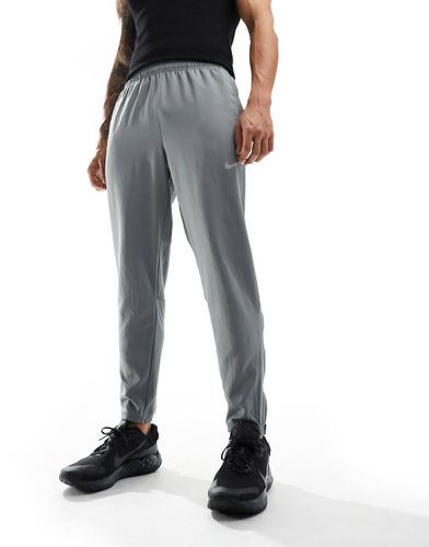 Challenger - Pantalon de jogging tissé en tissu Dri-FIT - Nike Running - Modalova