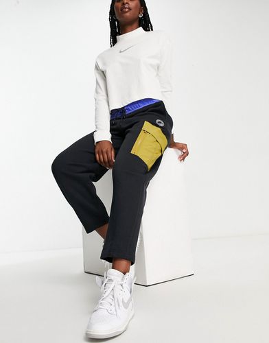 Sports Utility - Pantalon cargo en polaire - Noir et mousse - Nike - Modalova