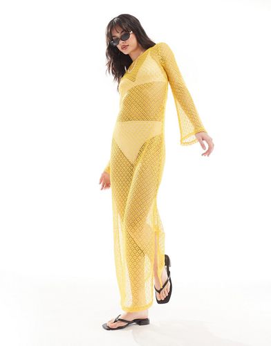 Styled by Claudia Bhimra - Robe longue en maille crochetée transparente avec dos échancré à détails noués - Something New - Modalova