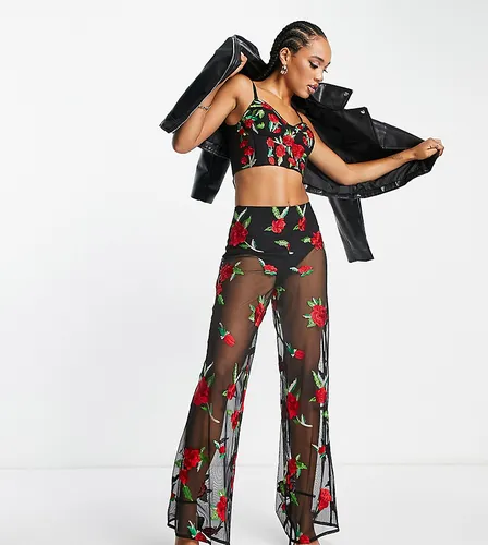 Pantalon évasé d'ensemble transparent à taille haute avec roses brodées - Starlet - Modalova