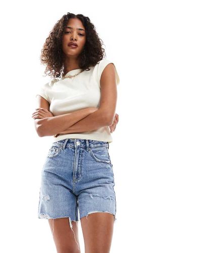 D93 - Short en jean long - teint - Stradivarius - Modalova