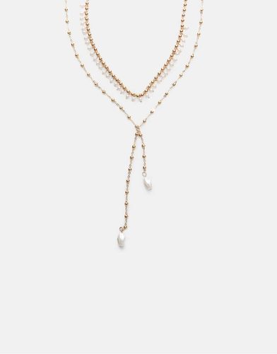 Lot de 2 colliers style lasso en perles fantaisie - Dor - Stradivarius - Modalova