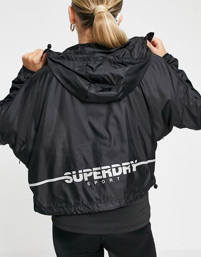 Veste d'entraînement légère à capuche - Superdry Sport - Modalova