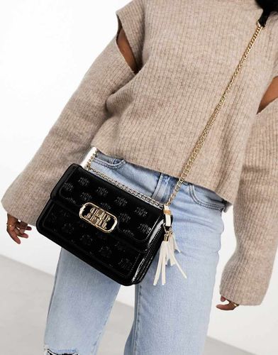 Sac seau avec poignée anneau en métal River Island en coloris Noir