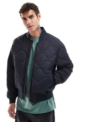 Bomber imperméable à motif matelassé - Bleu foncé - Tommy Hilfiger - Modalova