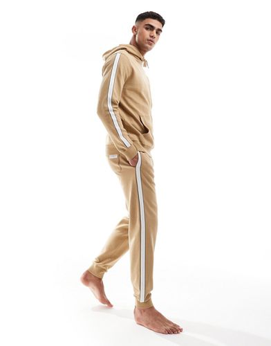 Pantalon de jogging confort à bande contrastante - Beige/blanc - Tommy Hilfiger - Modalova