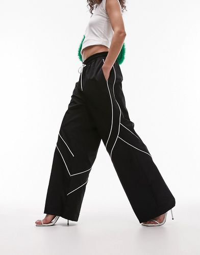 Pantalon de survêtement large en nylon avec passepoils contrastants - Noir - Topshop - Modalova
