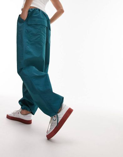 Pantalon parachute cargo bouffant et oversize en nylon - Sarcelle - Topshop - Modalova