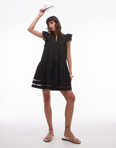 Robe courte en broderie anglaise à franges - Topshop - Modalova