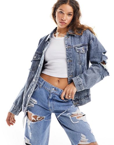 Veste en jean effet usé - Urban Revivo - Modalova