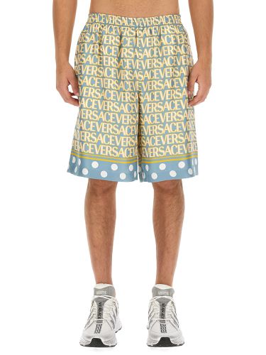 Versace shorts with logo - versace - Modalova