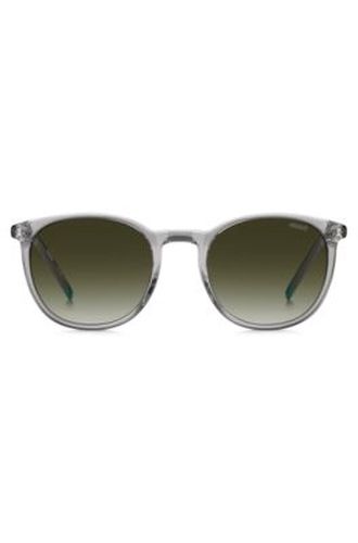 Lunettes de soleil teinte grise transparente avec logo vert - HUGO - Modalova