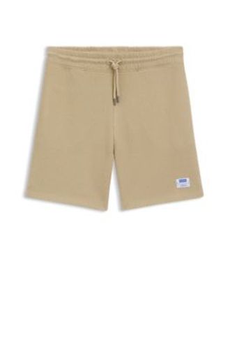 Short ample en coton mélangé à la structure gaufrée - HUGO - Modalova