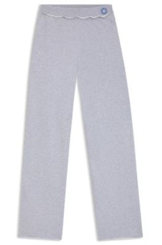 Bas de survêtement en molleton de coton avec taille à logo - HUGO - Modalova