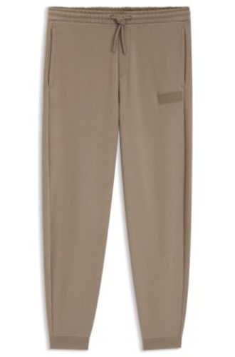 Pantalon Relaxed en molleton novateur - Boss - Modalova