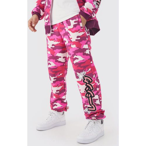 Jogging large à écusson camouflage - Boohooman - Modalova