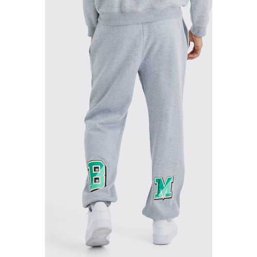 Jogging oversize universitaire - Boohooman - Modalova