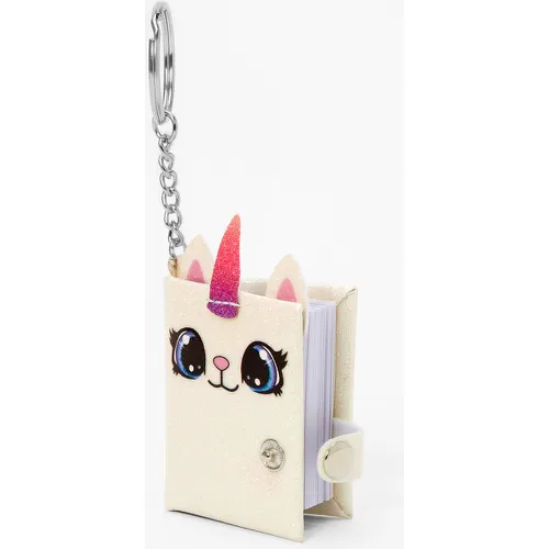 Porte-clés mini journal chat-licorne - Claire's - Modalova