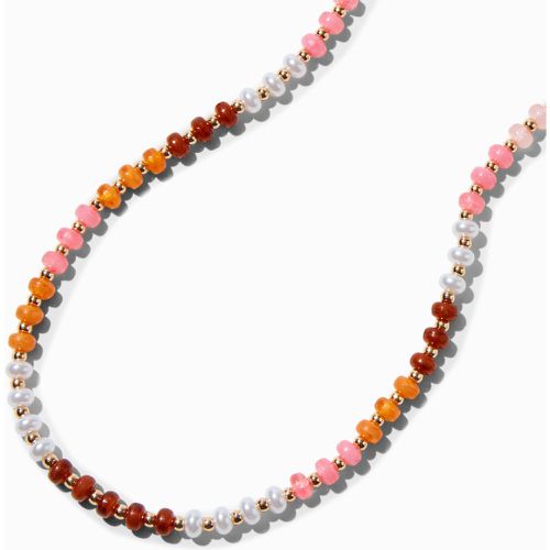 Collier perlé tons chauds couleur - Claire's - Modalova