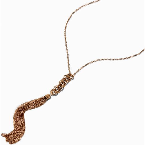 Long collier à pompon et anneaux couleur - Claire's - Modalova