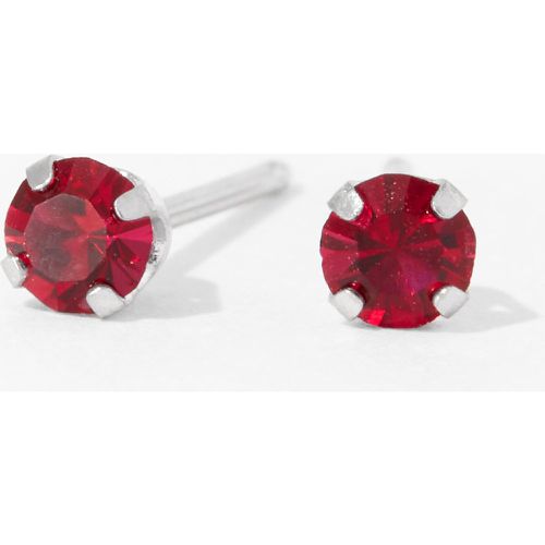 Kit de piercing pour les oreilles avec clous d’oreilles ornés de cristaux couleur rubis juillet 3 mm en or 9 carats au fini rhodié avec lotion de - Claire's - Modalova
