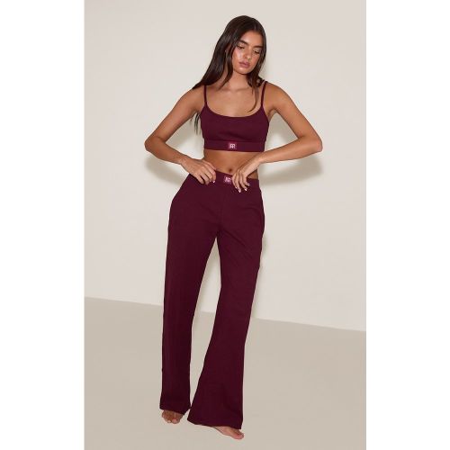 Pantalon de pyjama large tonal côtelé à taille élastique | Taille Large - PrettyLittleThing - Modalova